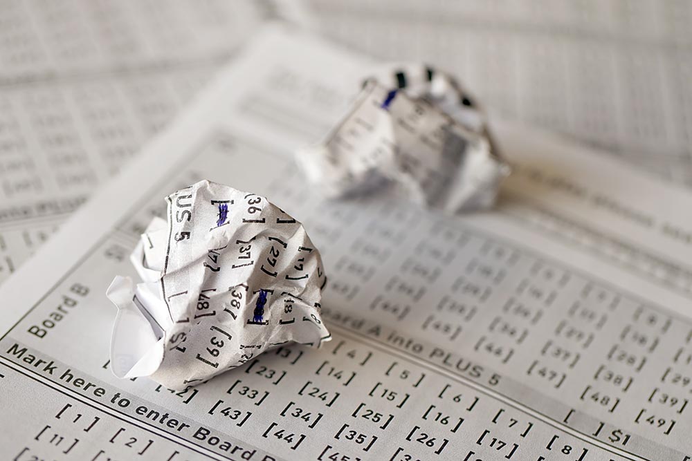 crumpled lottery tickets as symbol losing lottery game unlucky gambling results misfortune