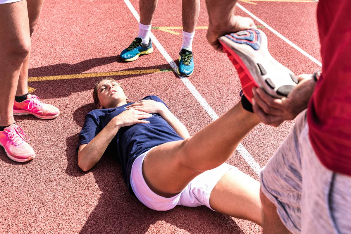 female athlete injured on athletic run training 2022 12 09 04 46 41 utc 1